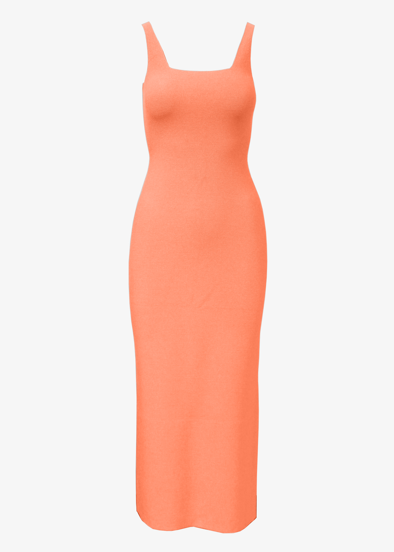 Peach knit slip dress on a white background